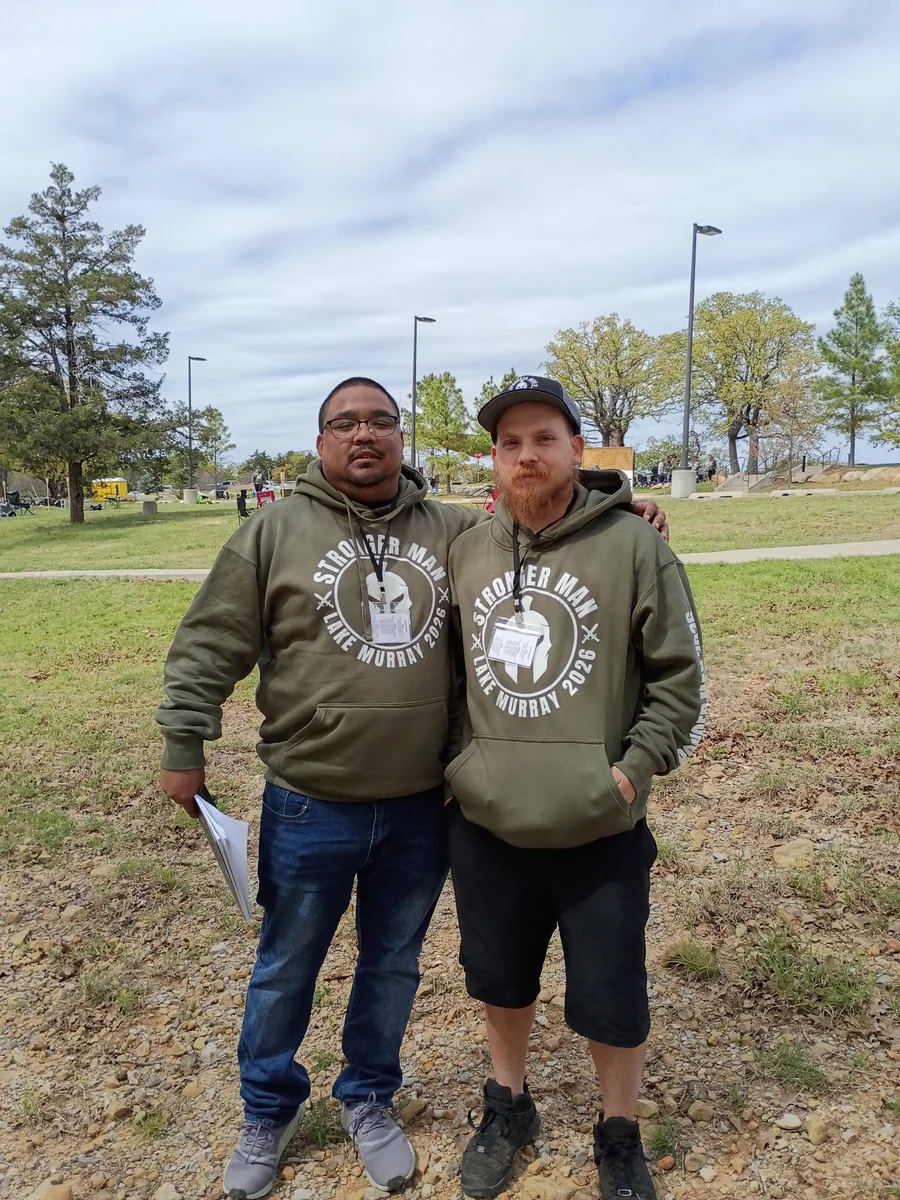James Robbins and Alex Martinez, owners of TopBins Cleaning, standing together outdoors